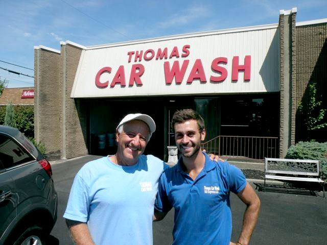 Alex and Eli in front of Thomas Car Wash